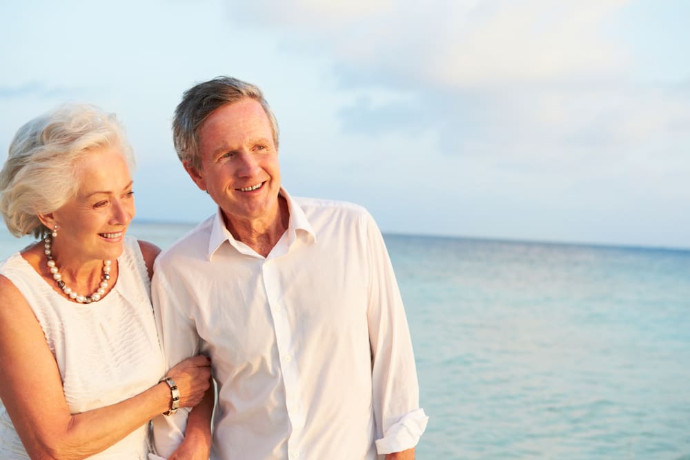 Happy old couples in beach.