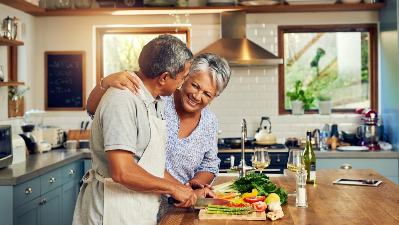 Senior Citizen Couple Cooking Together